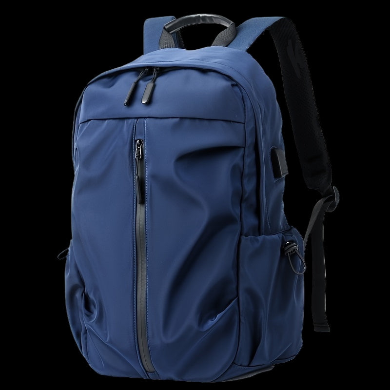 Blue backpack with black zippers on a white background