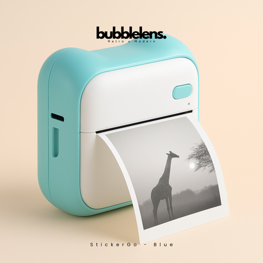 Blue bubble printer with a printed photo of a giraffe on a beige background, featuring the brand 'bubble lens'.