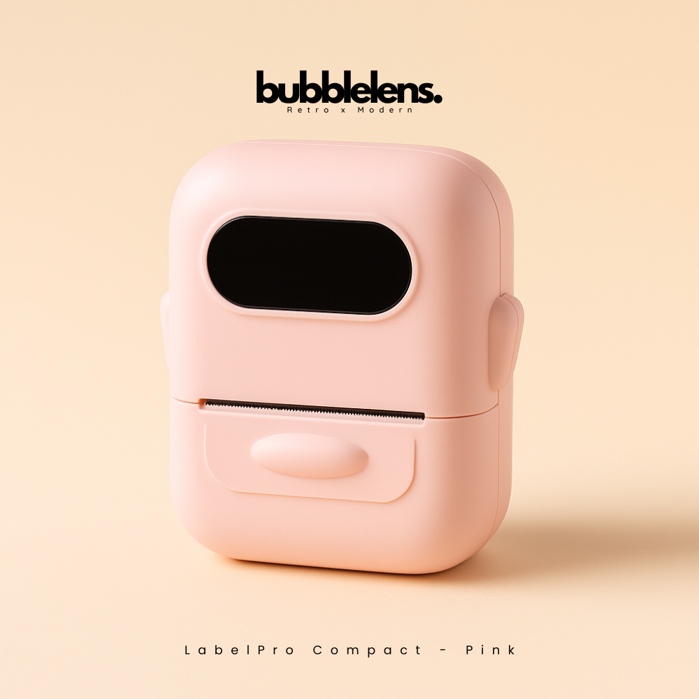 Pink label printer case with 'bubble lens' branding on a beige background