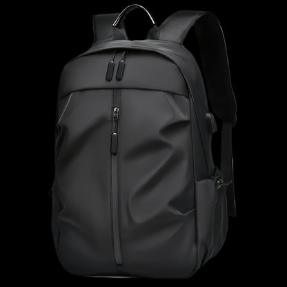 Black backpack on a white background