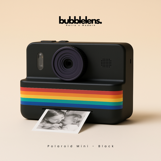 Black instant camera with rainbow stripe and 'bubblelens' branding on a beige background