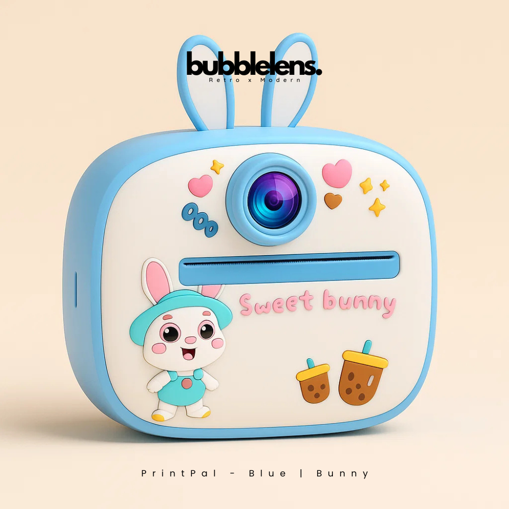 Children's camera with bunny design and 'bubble lens' branding on a beige background